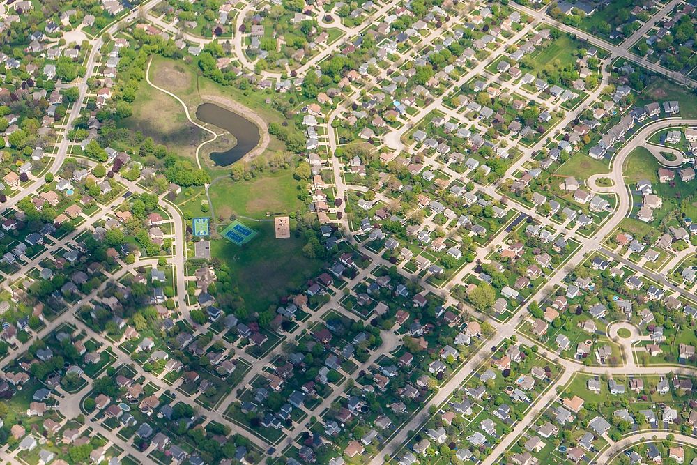 Ariels of Chicago, Illinois suburbs from 10,000 feet May 6, 2017. USDA photo by Preston Keres. Original public domain image…