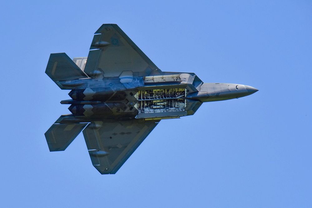 A U.S. Air Force F-22 Raptor fighter jet performs a demonstration during the South Carolina National Guard Air and Ground…