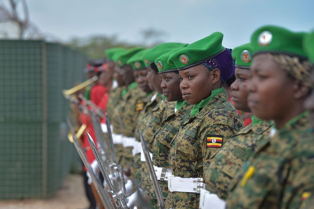 African Union soldiers wait to perform a Guard of Honor at celebrations to mark Africa Day held at the AMISOM headquarters…