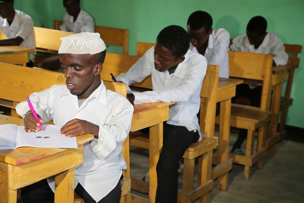 Students sit for their final term exam at Mujama Secondary School in Beledweyne, Somalia, on May 22, 2017. AMISOM Photo.…