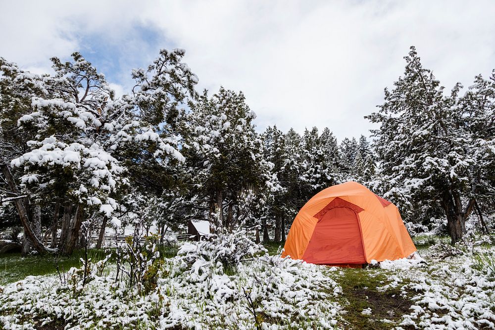 Shoveling snow in Mammoth Campground after a spring snowstorm. Original public domain image from Flickr