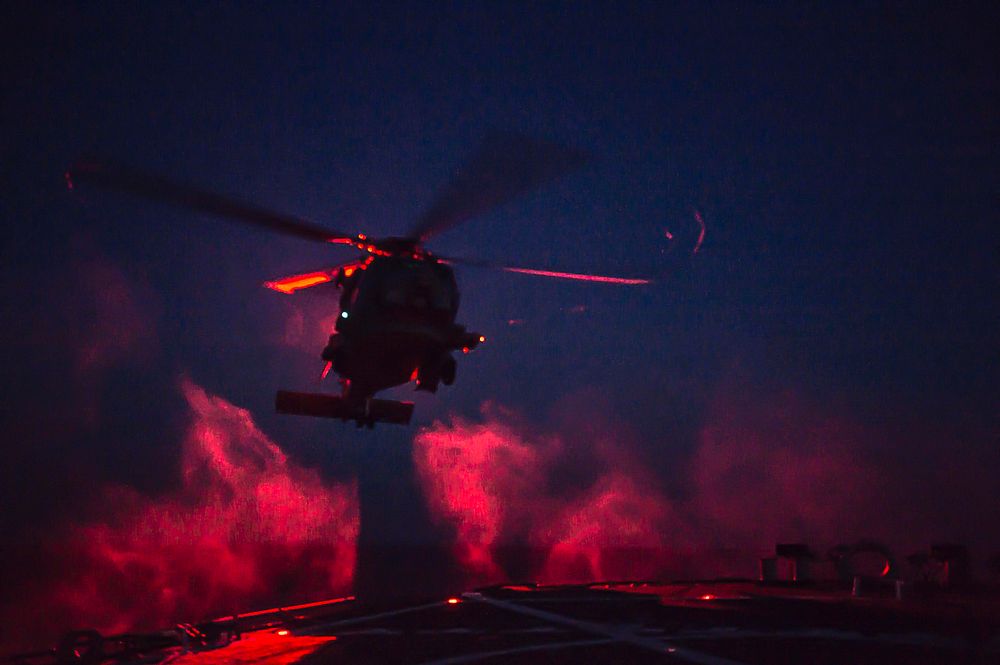 MEDITERRANEAN SEA. An MH-60R Sea Hawk helicopter, assigned to Helicopter Maritime Strike Squadron (HSM) 46, Det. 1, lands…