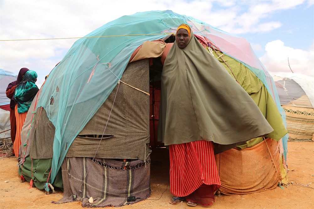 Sadia Aden Maow, an IDP in Beledweyne, Somalia, stands in front of her makeshift tent during the holy month of Ramadan on…