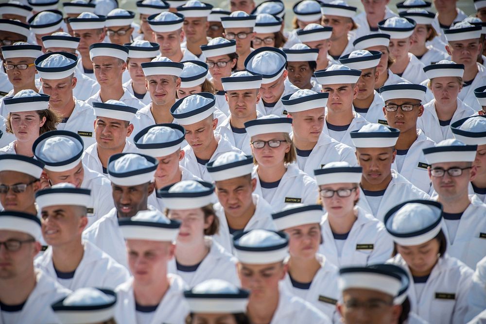 Incoming midshipmen participate in the Oath of Office Ceremony, during induction day (I-day) at the U.S. Naval Academy in…
