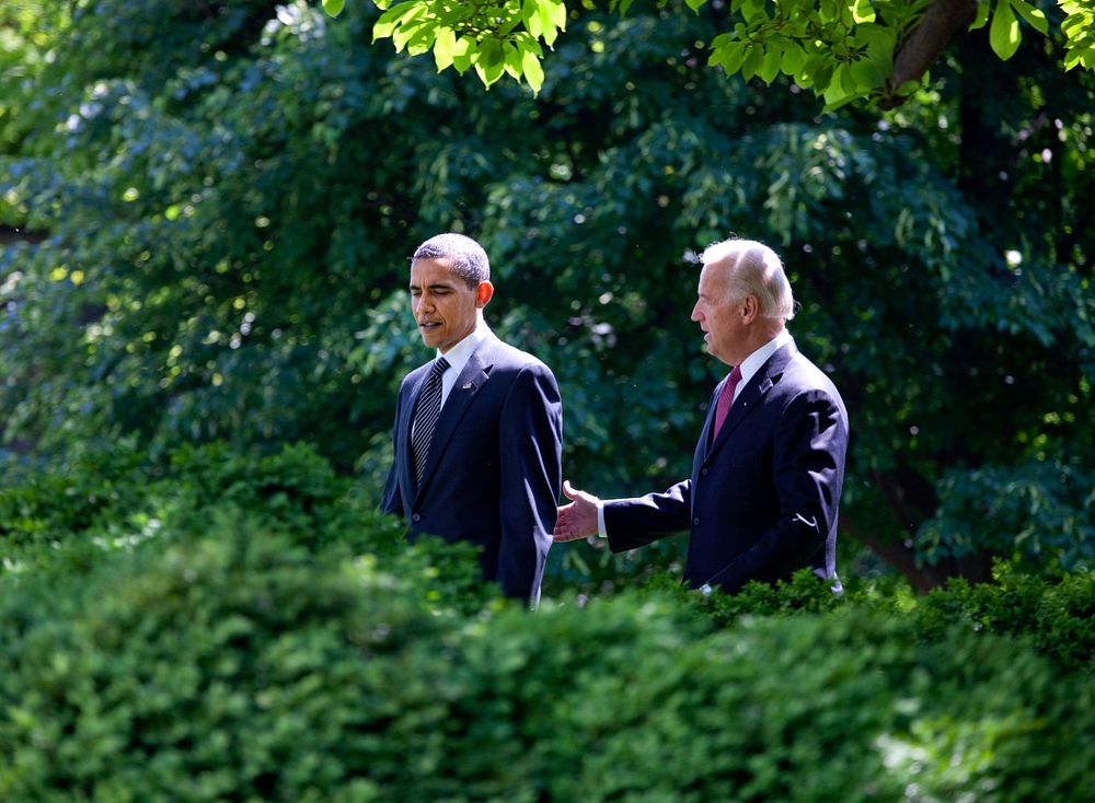 President Barack Obama and Vice President Joe Biden walk to the Rose Garden of the White House to take part in the Top Cops…