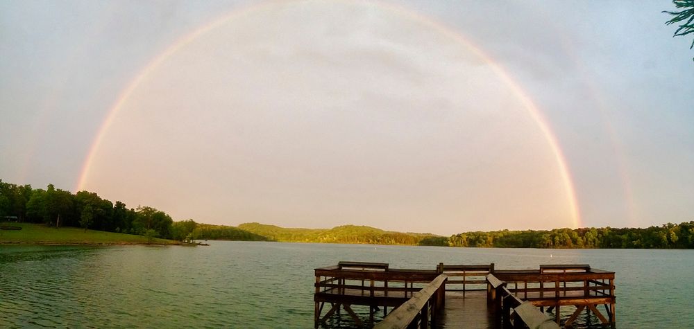 Rainbow over Nolin River LakeA double rainbow spans across the sky after a storm at Nolin River Lake, Bee Spring, Kentucky.…