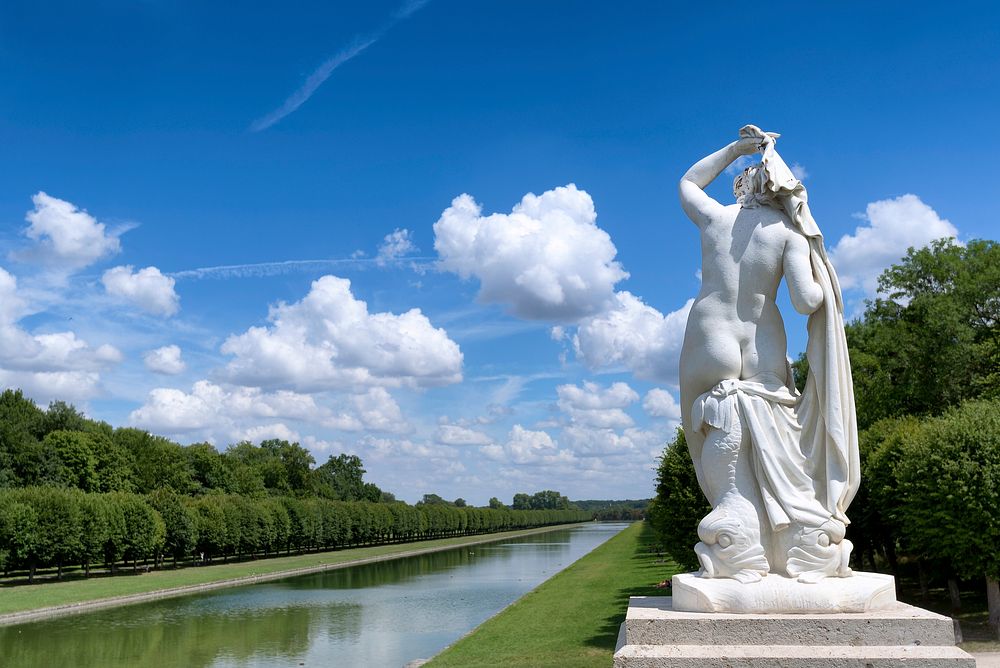 Statue at The Grand Canal, Chateau Fontainebleau, France.