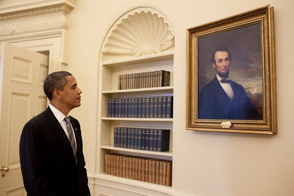 President Barack Obama, stands next to a portrait of Abraham Lincoln, as he waits for President &Aacute;lvaro Uribe of…