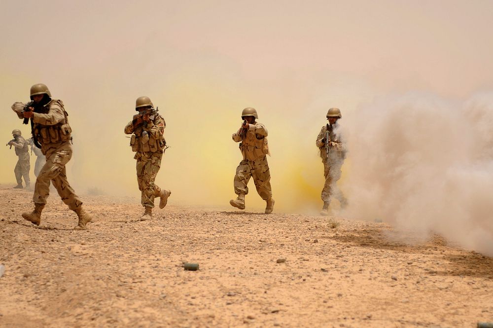 Iraqi soldiers from 20th Brigade, 5th Iraqi Army Division participate in a mortar demonstration for Iraqi officials on a…