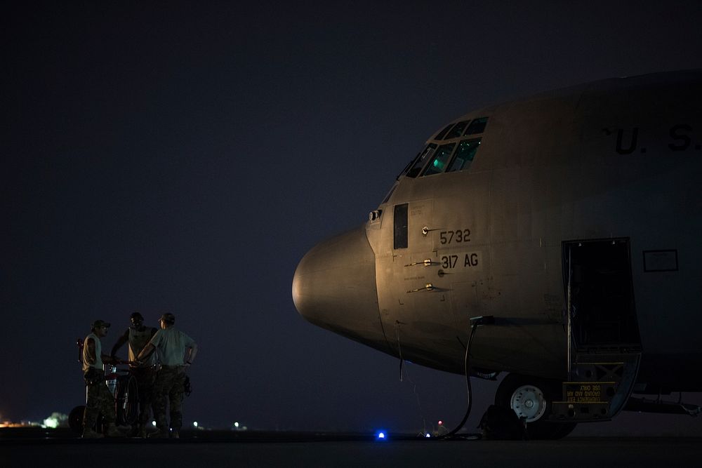 U.S. Airmen from the 75th Expeditionary Airlift Squadron (EAS) conduct C-130J Super Hercules cargo operations in East…