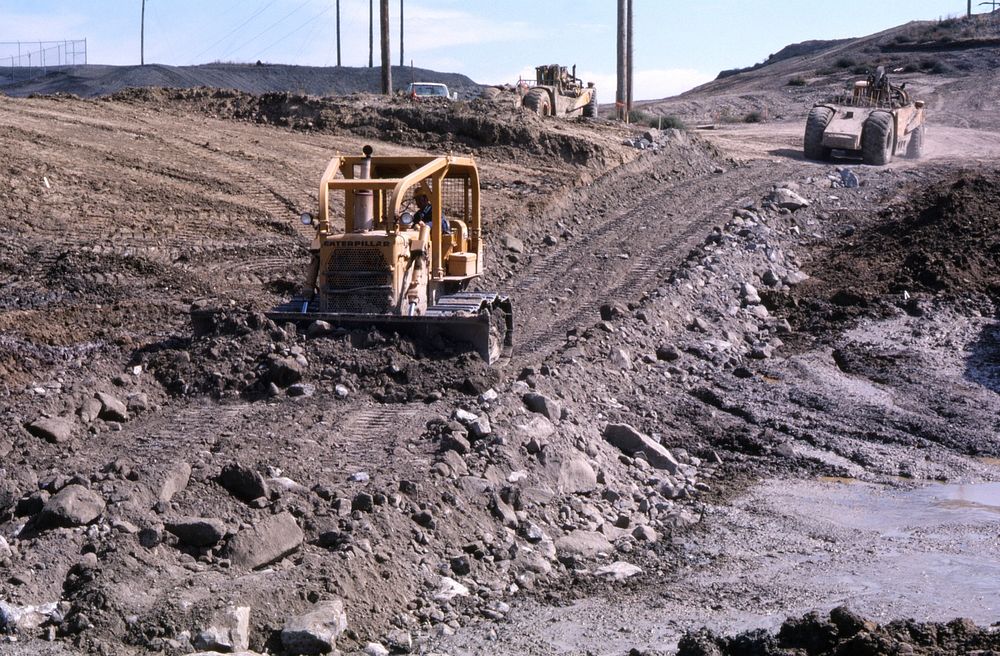 Tractors moving dirt near Alkali Creek, September 1977. Original public domain image from Flickr
