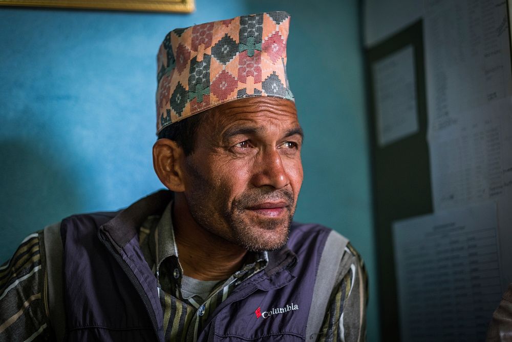 Man with kufi looking away, Chainpur, Bajhang District, Nepal, October 2017.