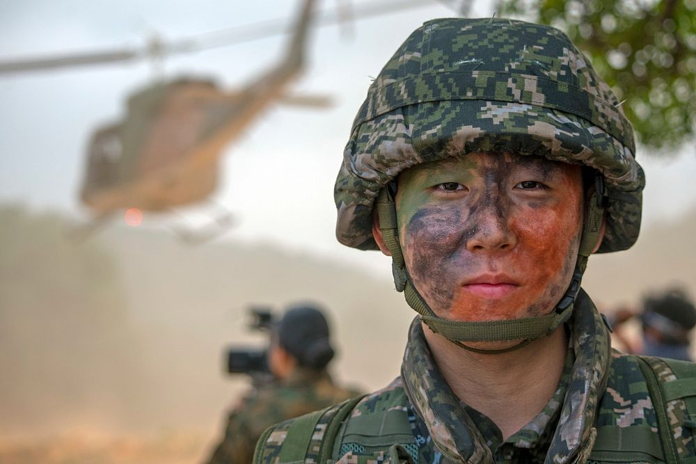 Republic of Korea Marine Lance Cpl. Ho Yun Jung poses for a photo on Hat Yao Beach, Rayong province, Thailand during…