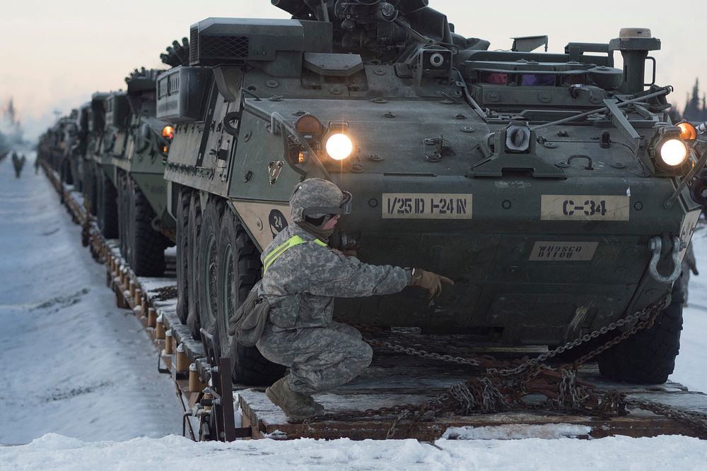 Soldiers assigned to the 1st Stryker Brigade Combat Team, 25th Infantry Division, U.S. Army Alaska, perform railhead…