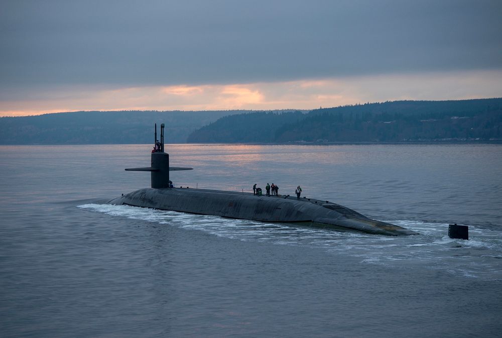 The Ohio-class ballistic missile submarine USS Pennsylvania (SSBN 735) transits the Hood Canal as the boat returns to its…