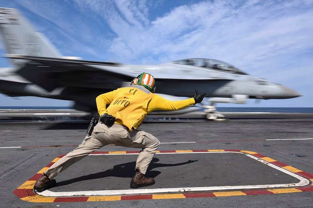 U.S. Navy Lt. John Larnerd launches an F/A-18F Super Hornet, assigned to the "Red Rippers" of Strike Fighter Squadron (VFA)…