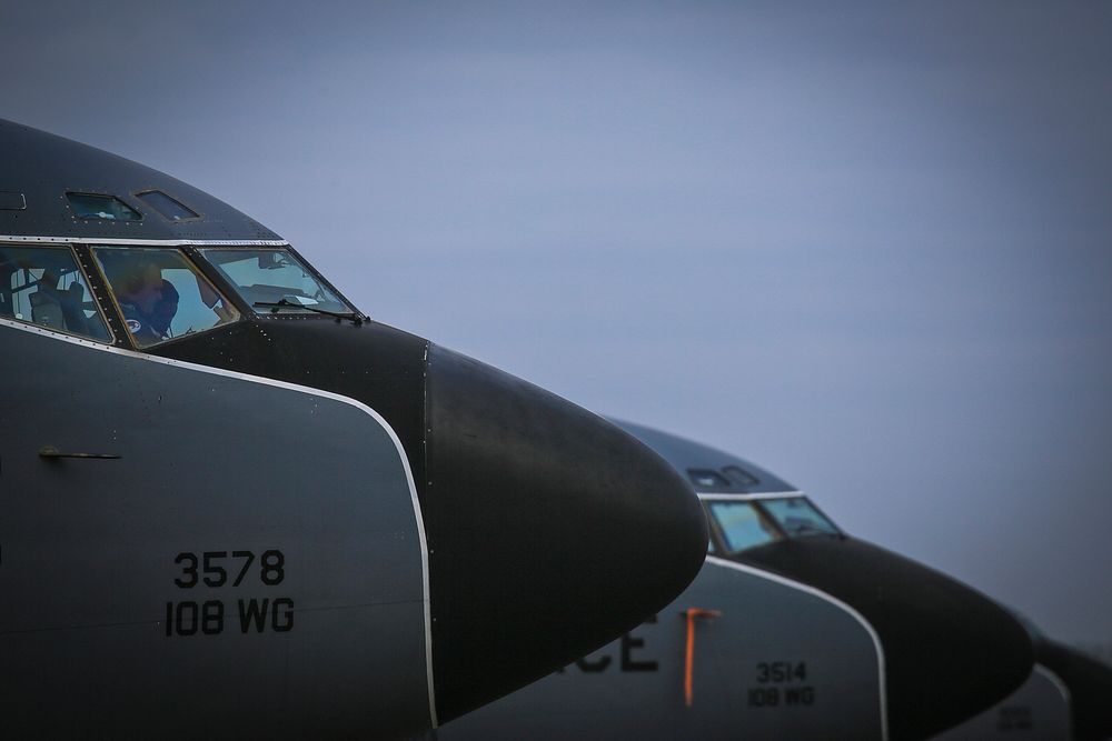 A New Jersey Air National Guard KC-135R Stratotanker crew from the 108th Wing prepares their aircraft for a training flight…