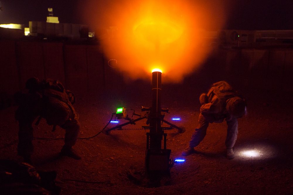 U.S. Marines with Task Force Southwest (TFSW) fire a 120mm mortar as a show of force at Camp Shorab, Afghanistan, March 10…