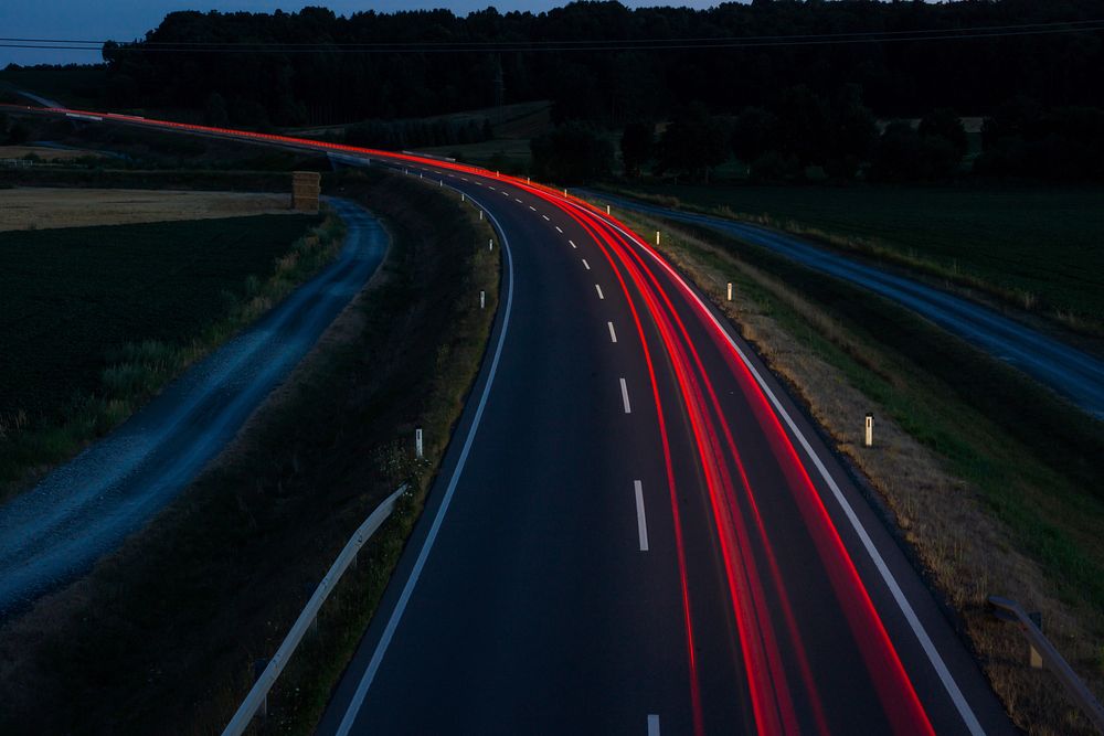 Long exposure car taillight on the highway. Free public domain CC0 photo