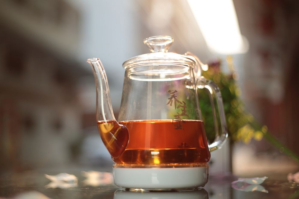 Tea in glass tea pot. Free public domain CC0 photo.