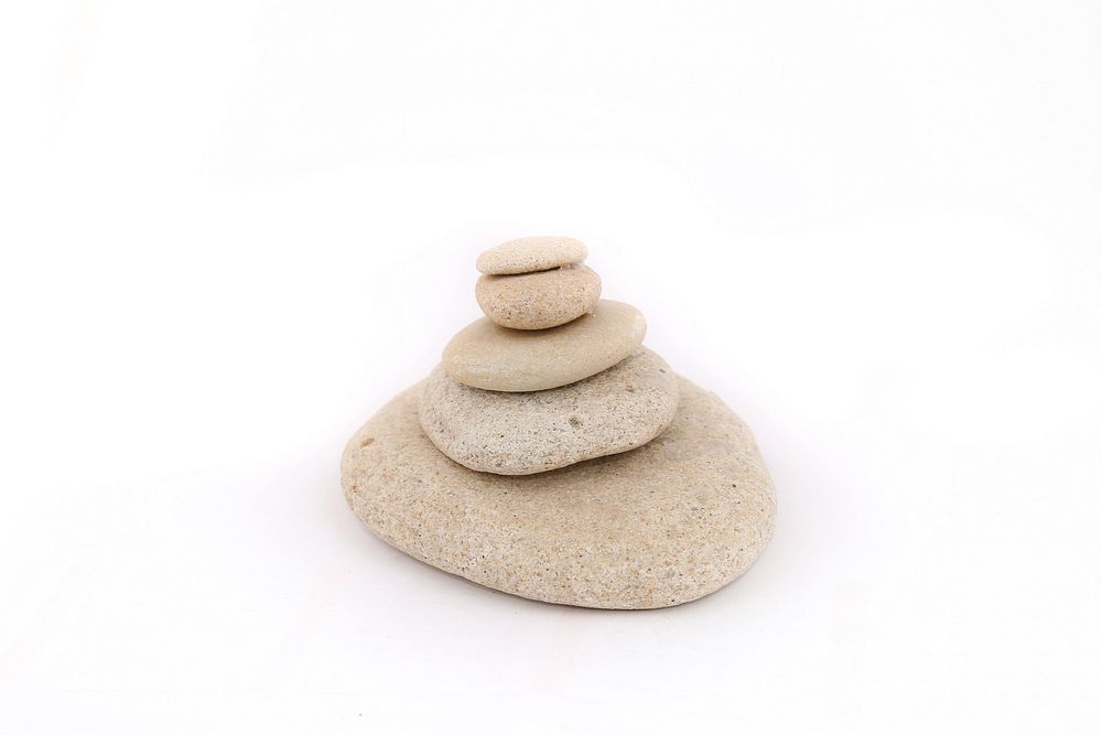 Balancing stones isolated on white background. Free public domain CC0 photo