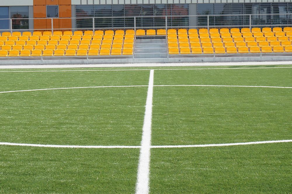 Empty football field stadium. Free public domain CC0 photo.