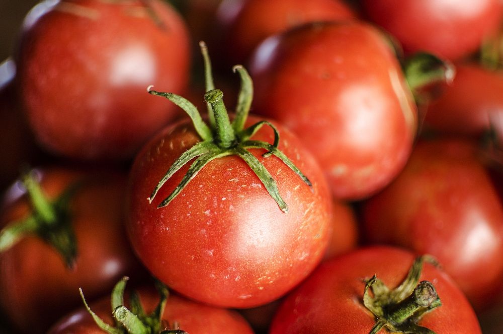 Closeup on pile of cherry tomatoes. Free public domain CC0 image.
