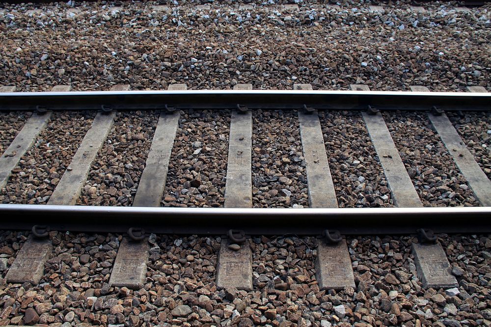 Empty train track. Free public domain CC0 photo.