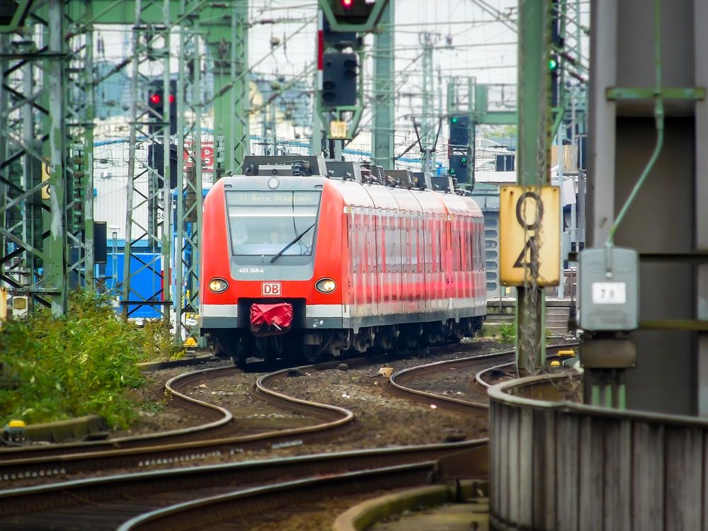 Moving train on a track. Free public domain CC0 photo.