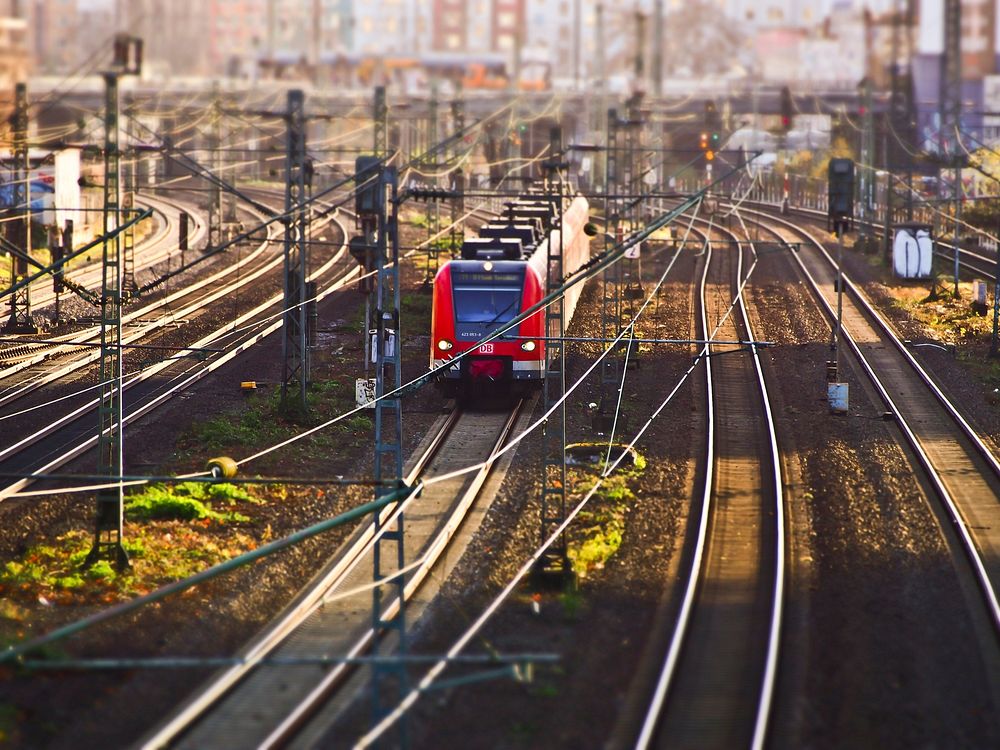 Moving train on a track. Free public domain CC0 photo.