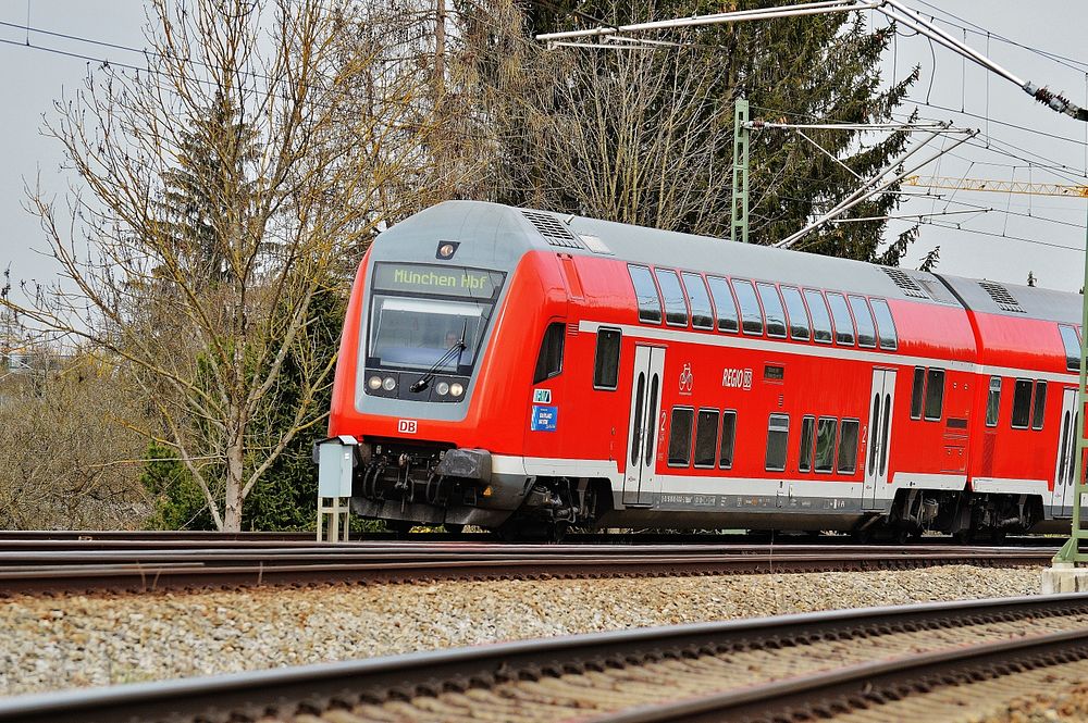 Moving train on a track. Free public domain CC0 photo.