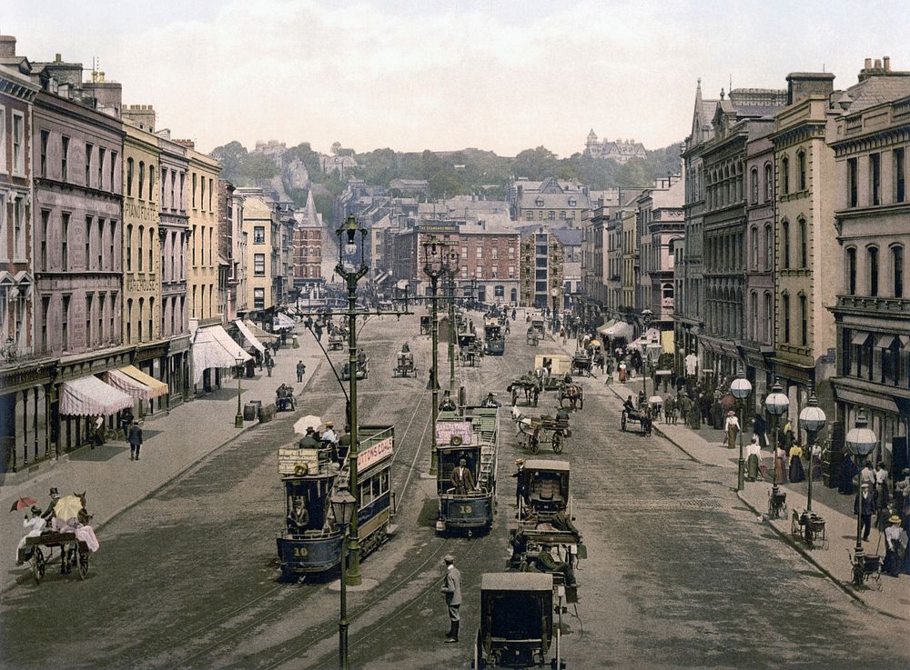 Vehicles and pedestrians on city road. Free public domain CC0 photo.