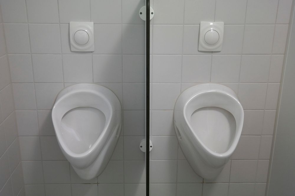 Urinals in bathroom at Oakland Airport. Free public domain CC0 image.