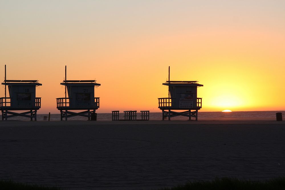 Beach hut at sunset. Free public domain CC0 image.