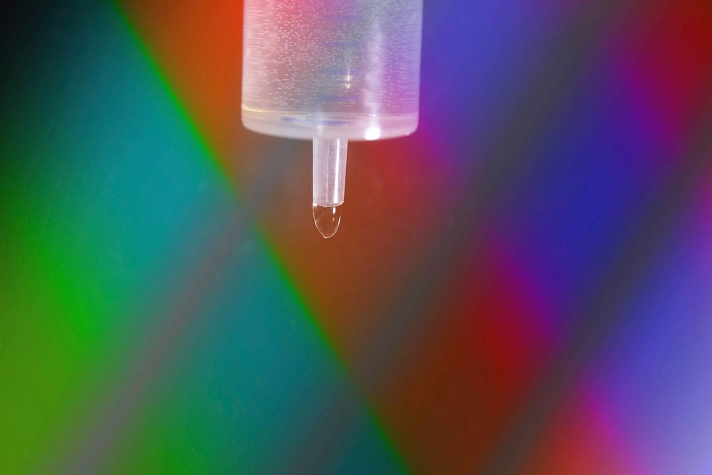 Water drop from syringe. Free public domain CC0 photo.