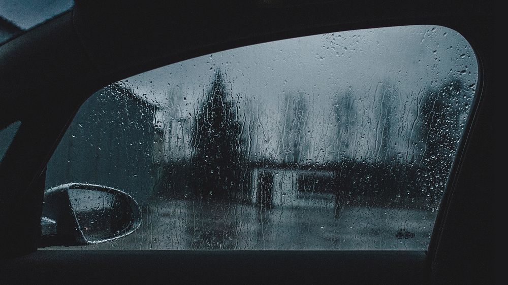 Parked car under the rain. Free public domain CC0 photo.