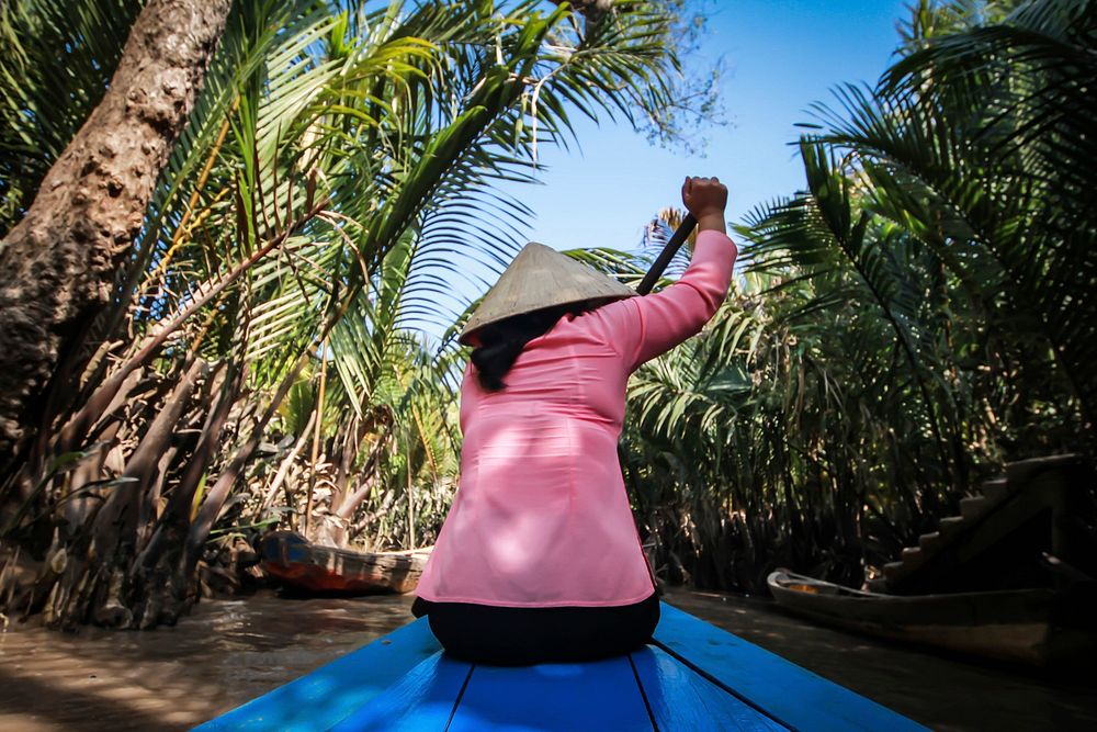 Woman on the Mekong river. Free public domain CC0 photo.