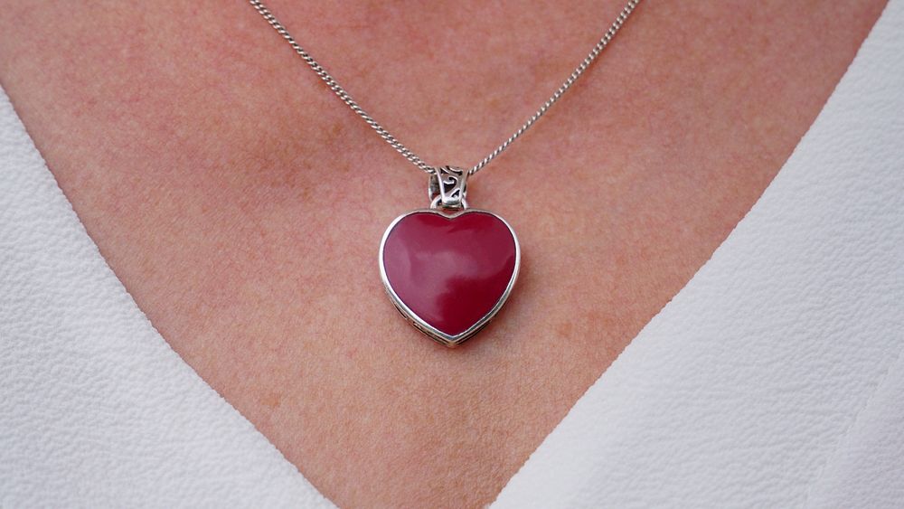 Silver heart shape stone necklace. Free public domain CC0 photo.