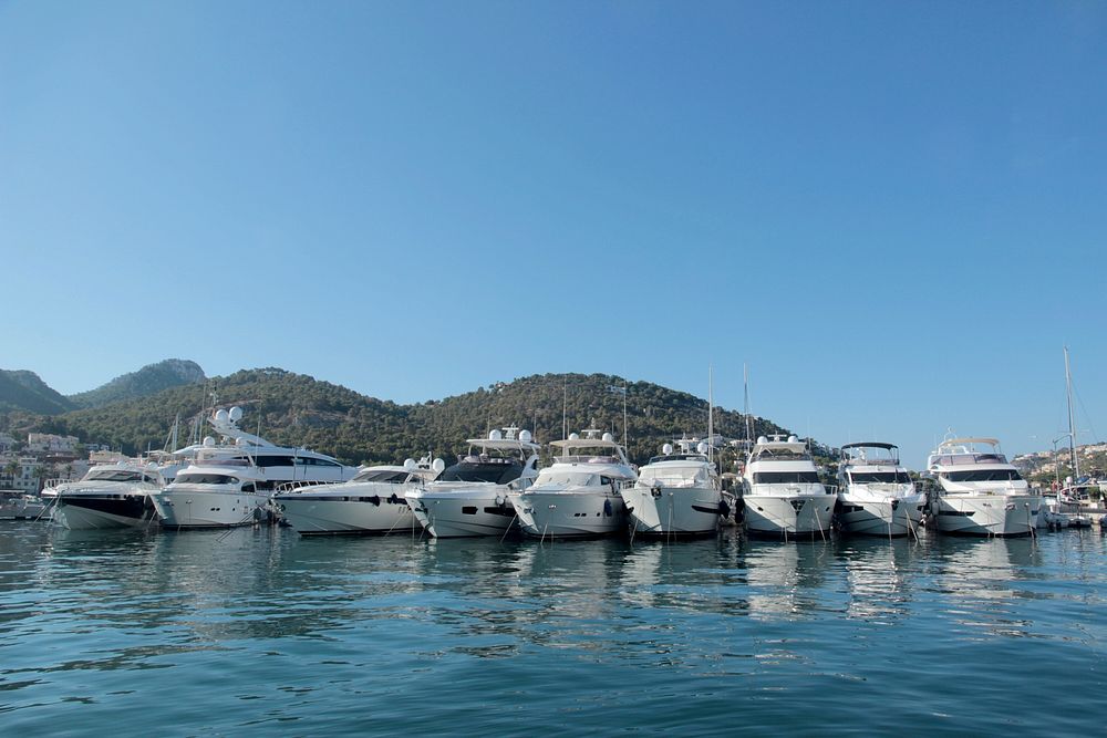 Yachts docking at marina. Free public domain CC0 photo.