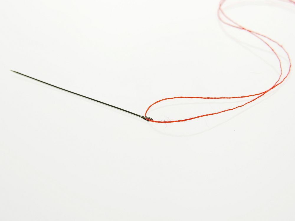 Needle and thread. Free public domain CC0 photo.