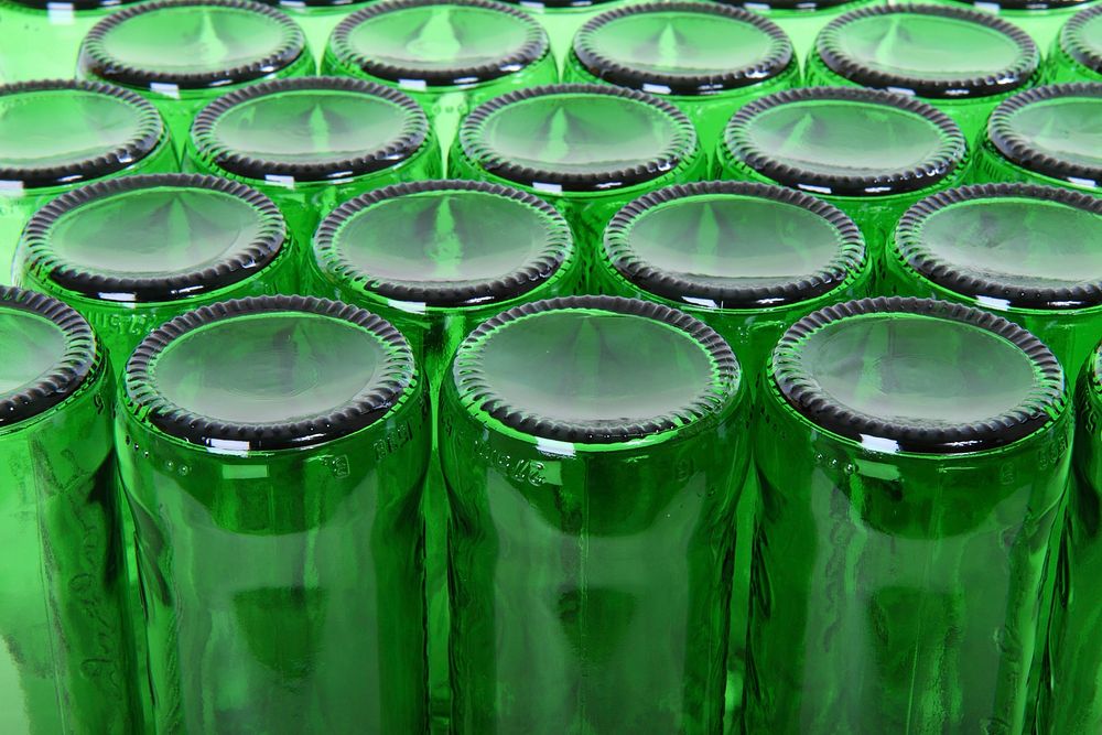 Piles of recycled glass beer bottles. Free public domain CC0 photo