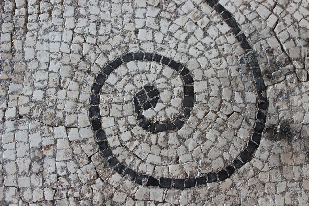 Mosaic tiled pedestrian footpath. Free public domain CC0 photo
