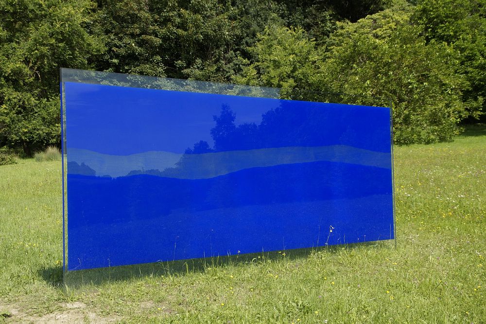 Blue glass on the field. Free public domain CC0 photo.