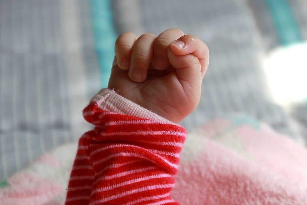 Tiny baby hand. Free public domain CC0 photo.