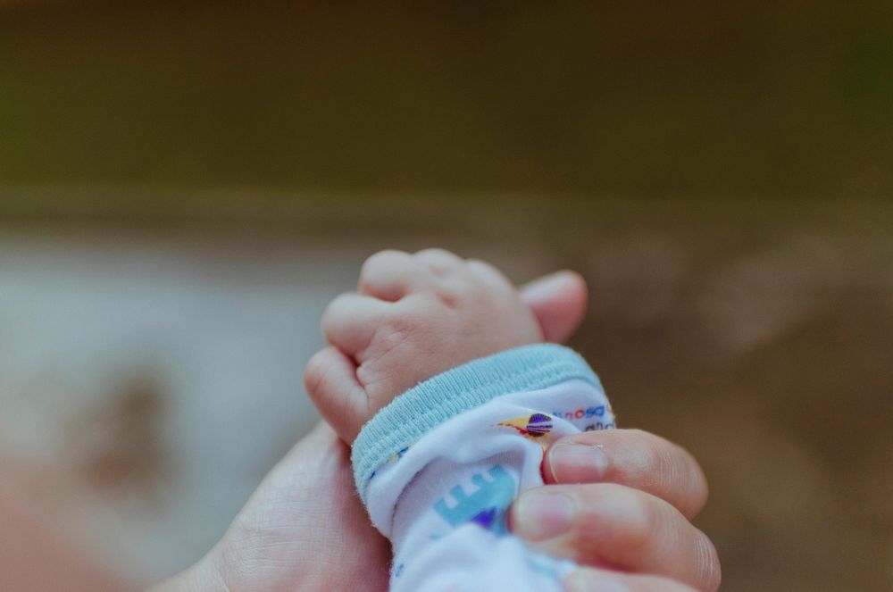 Tiny baby hand. Free public domain CC0 photo.