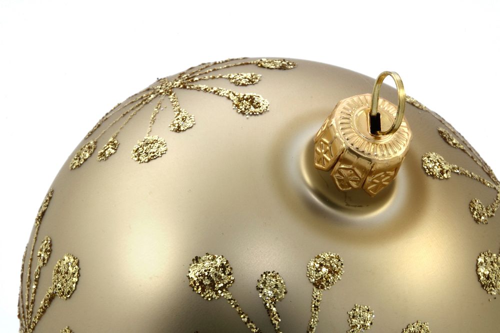 Closeup on golden Christmas ornament. Free public domain CC0 photo.
