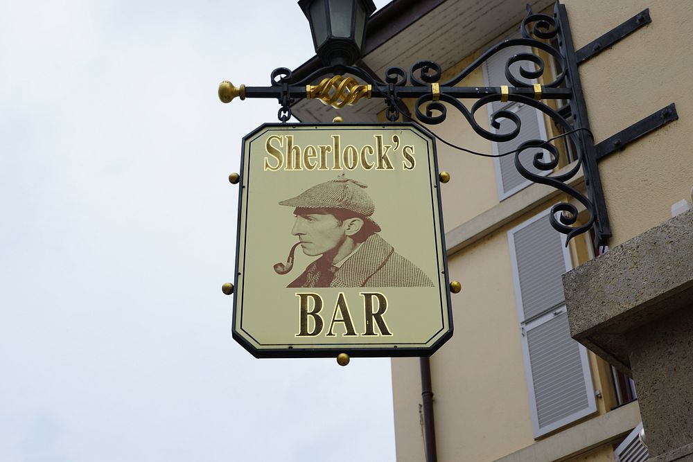 Sherlock's bar cafe sign. Free public domain CC0 photo.