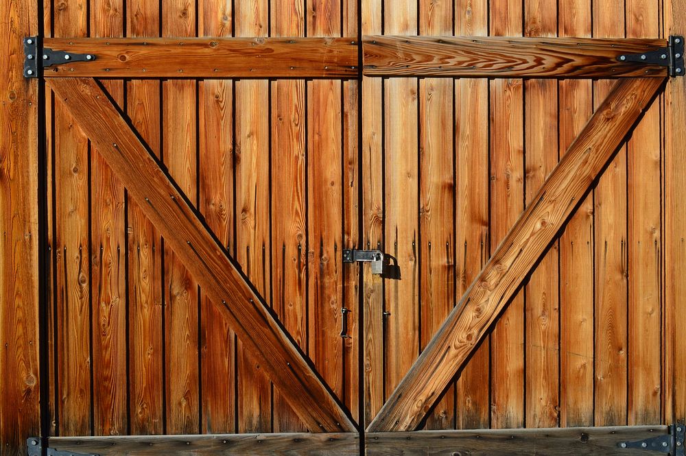 Wooden barn door. Free public domain CC0 photo.