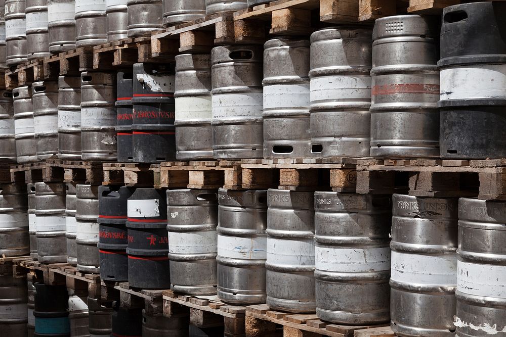 Stack of aluminium beer kegs. Free public domain CC0 image