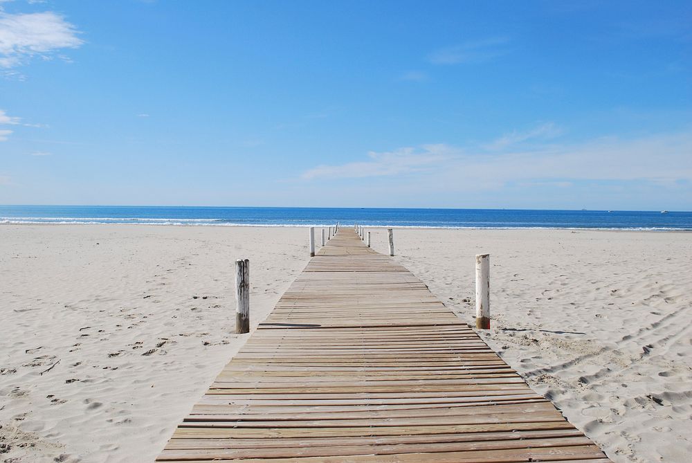 Boardwalk at seaside. Free public domain CC0 image.